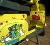 The Yellow Star Vespa by  Radok