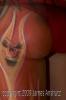 TIKI CHEEKY body art by Dennis Mathewson
